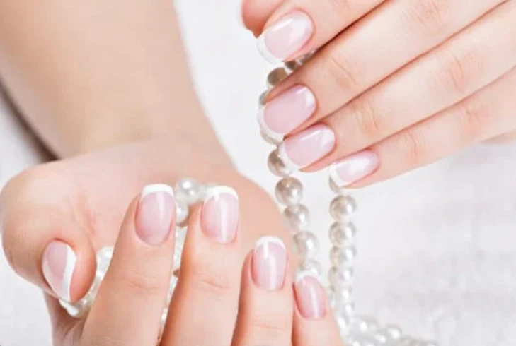 Classic French manicure with pearls