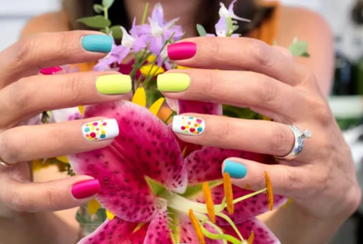 Multicolored pastel polka dot nails